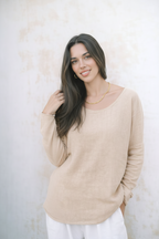 Women wearing a linen long sleeve top